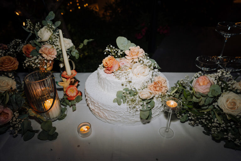 Wedding cake detail with candles, Lake Garda villa