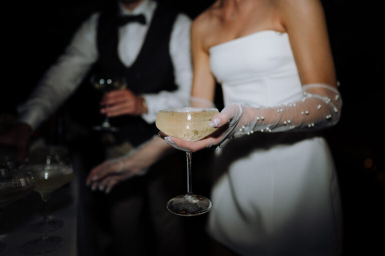 Close-up of champagne glass during the night reception