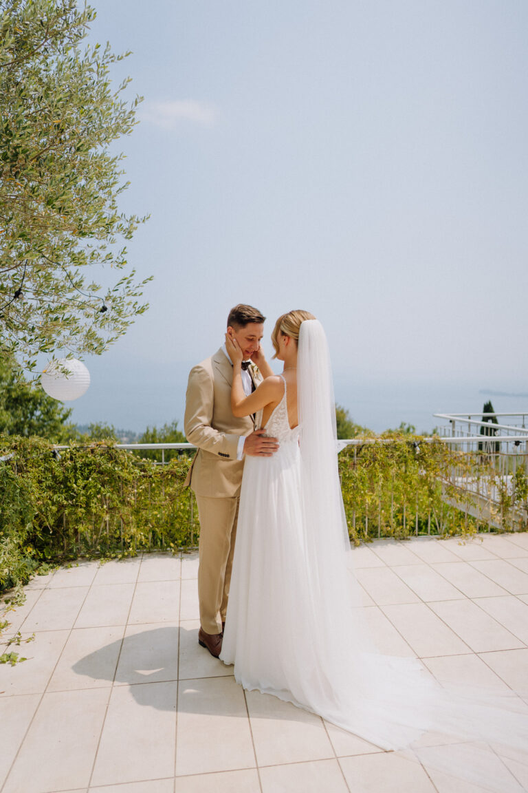 Couple portrait with Lake Garda backdrop, destination wedding