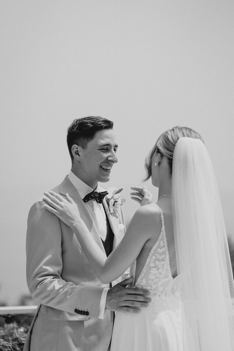 Couple portrait with Lake Garda backdrop, destination wedding