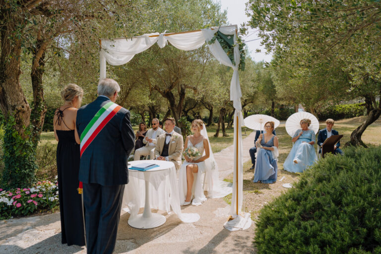 Guests and ceremony moment outdoors, Sirmione Lake Garda