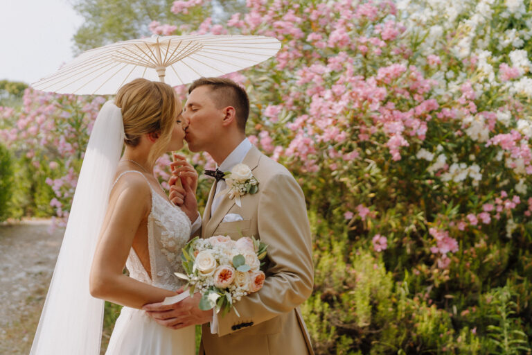 Couple portrait by Lake Garda, soft romantic moment.