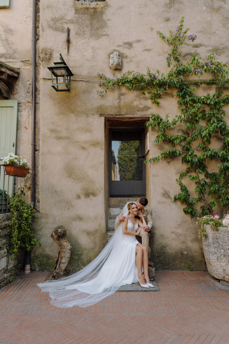 Bride and groom portrait in Sirmione streets, Lake Garda