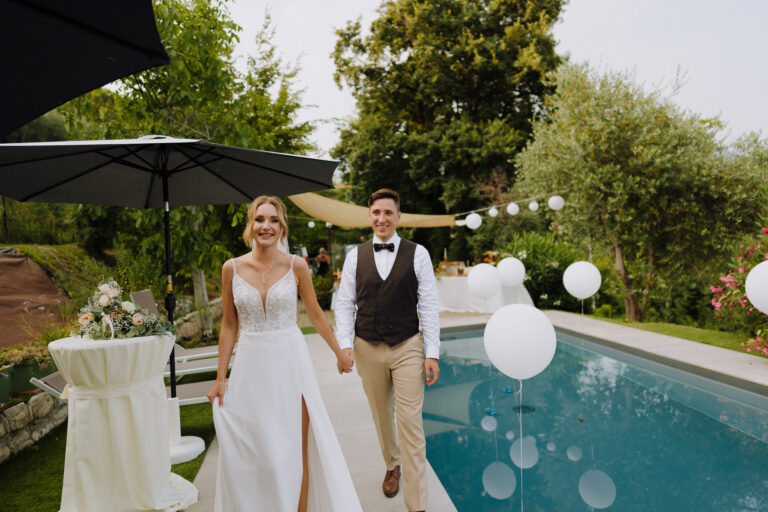 Bride and groom arriving at the aperitivo at the villa, Lake Garda.