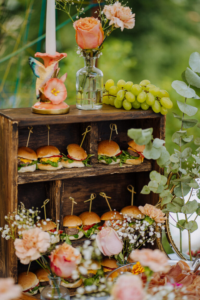 Aperitivo table with food and drinks, villa wedding Lake Garda