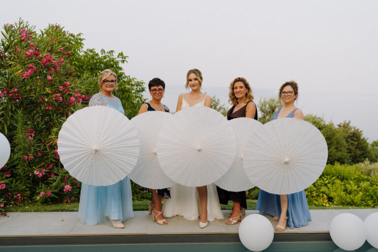 White umbrellas wedding photos Lake Garda