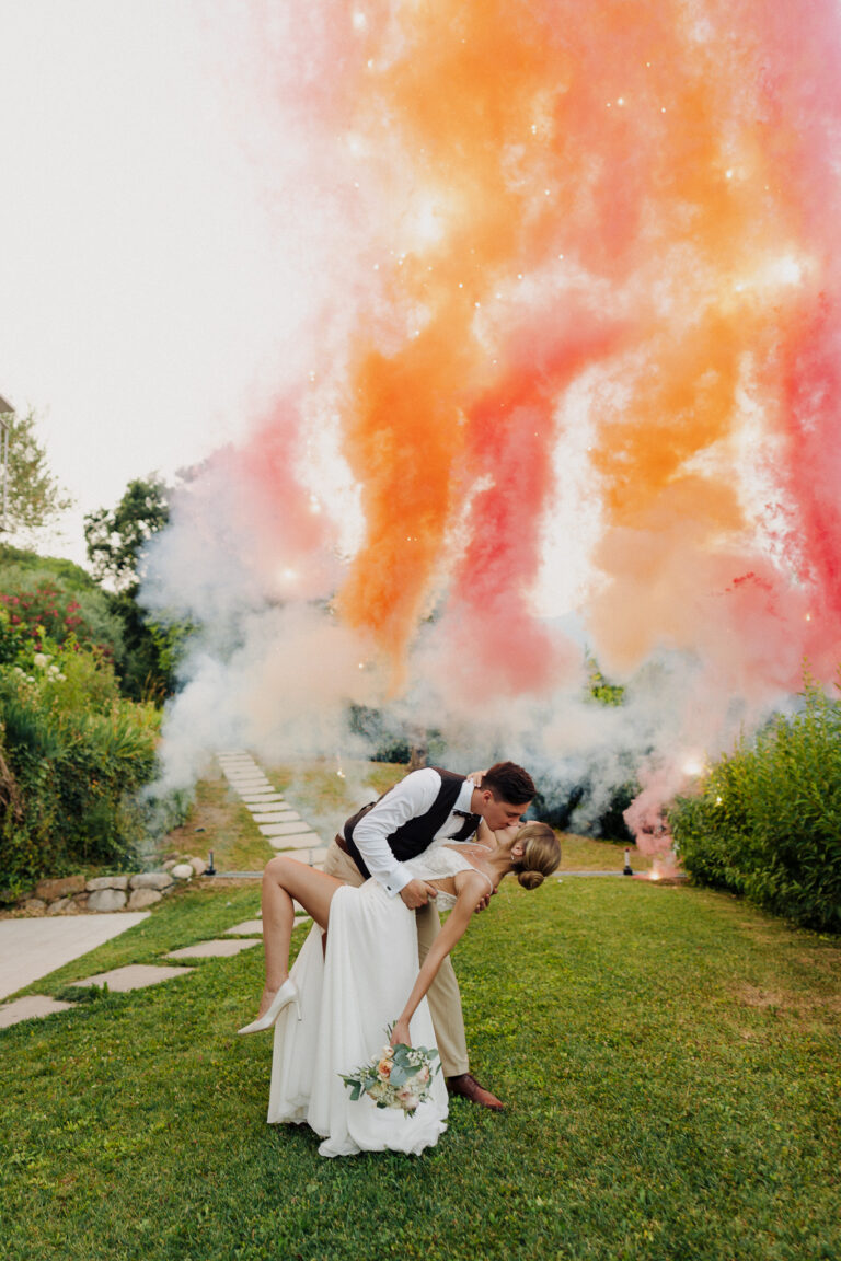 Party moment with smoke flare, Lake Garda celebration