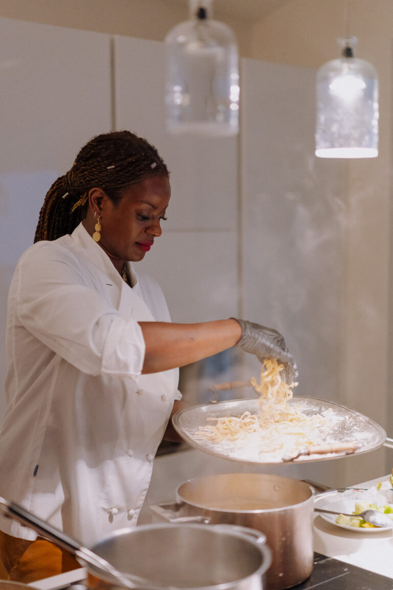 Chef preparing dinner, wedding reception Lake Garda