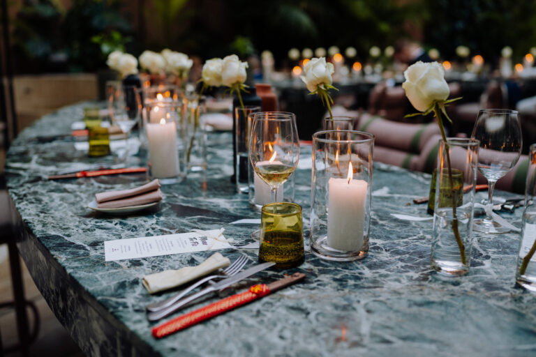 Candlelit table setting at Six Senses Rome, elegant intimate dinner reception
