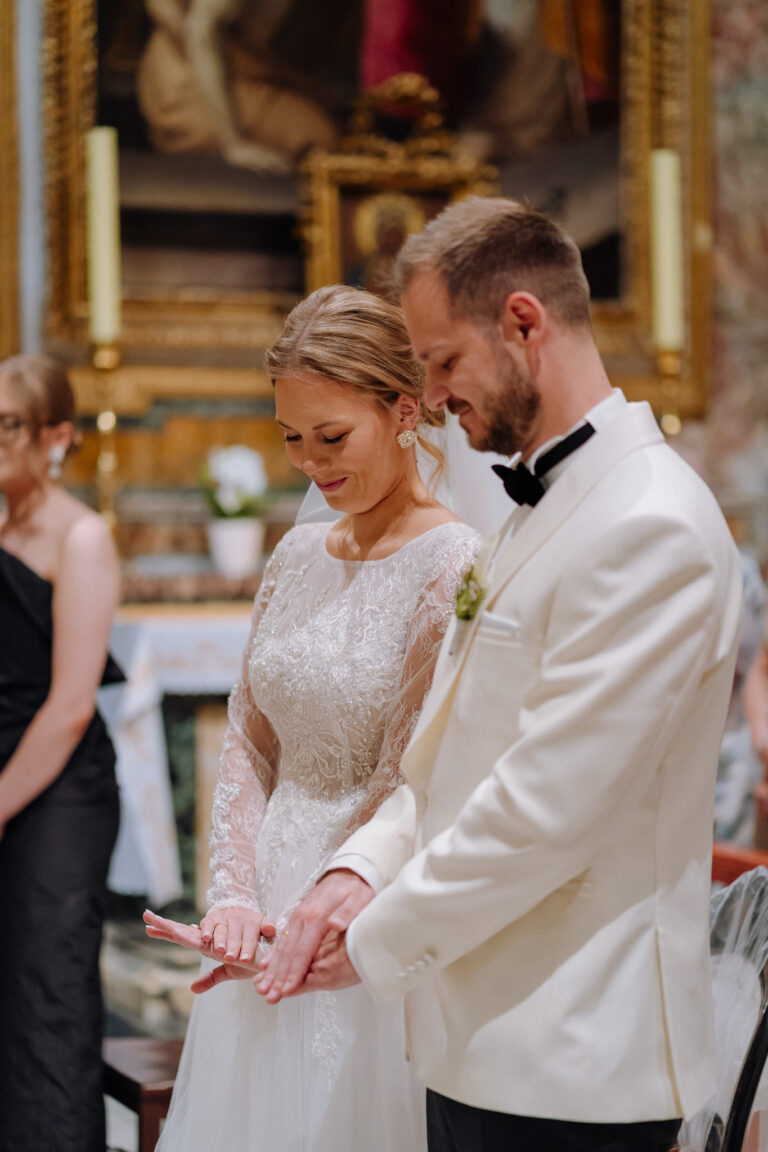Bride and groom in the church in Rome