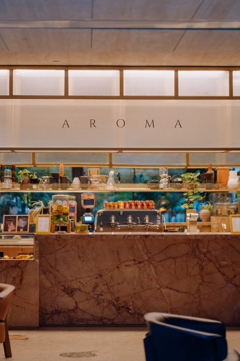 Reception interior at Six Senses Rome, warm tones and refined design details.