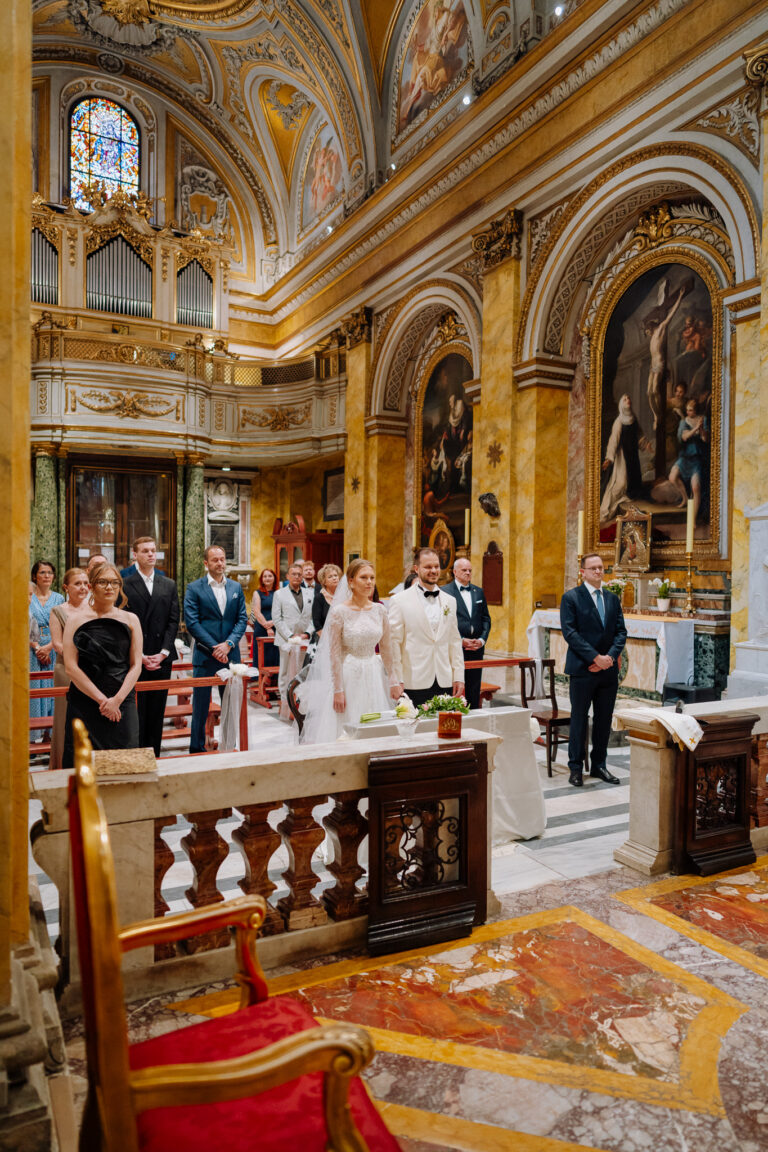 Wide view of the wedding ceremony inside the Polish church in Rome