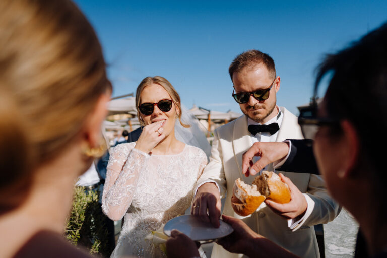 Bride and Groom enjoying aperitivo on the Six Senses Rome terrace, candid celebration.