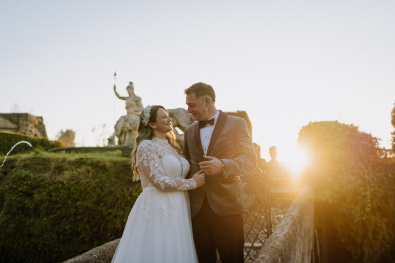 Golden hour couple portrait in Tivoli, Italy, warm sunset elopement photos.