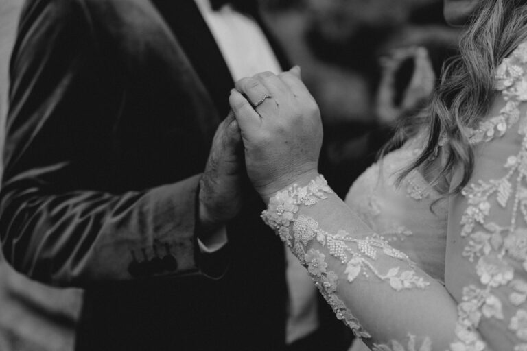 Close up of hands and rings, intimate elopement detail in Tivoli, Italy.