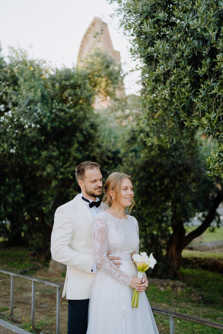 Bride and groom portrait in Rome, soft light and greenery