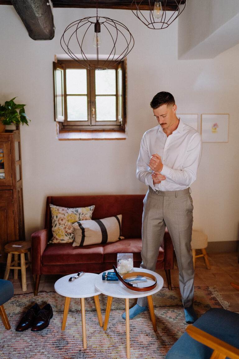 Groom getting ready at Podere Ferrale in Chianti, Tuscany
