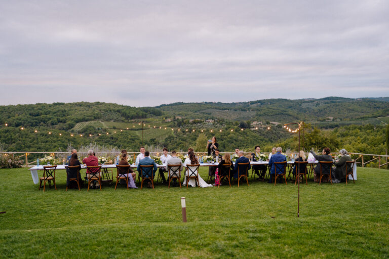 Wide view of guests during outdoor reception, Tuscany