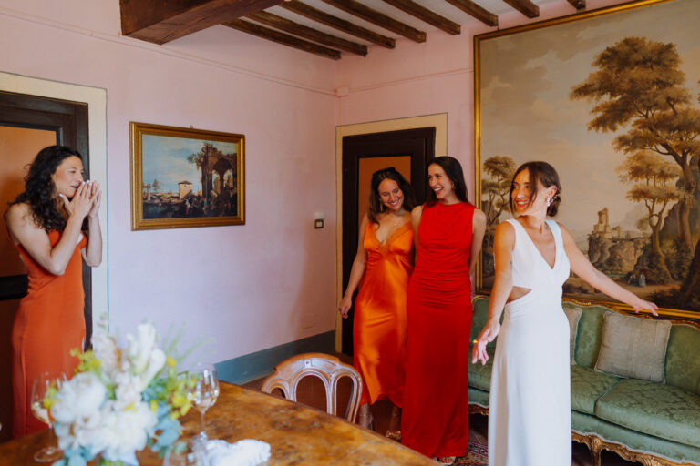 Bride with bridesmaids in Villa Cini, Tuscany