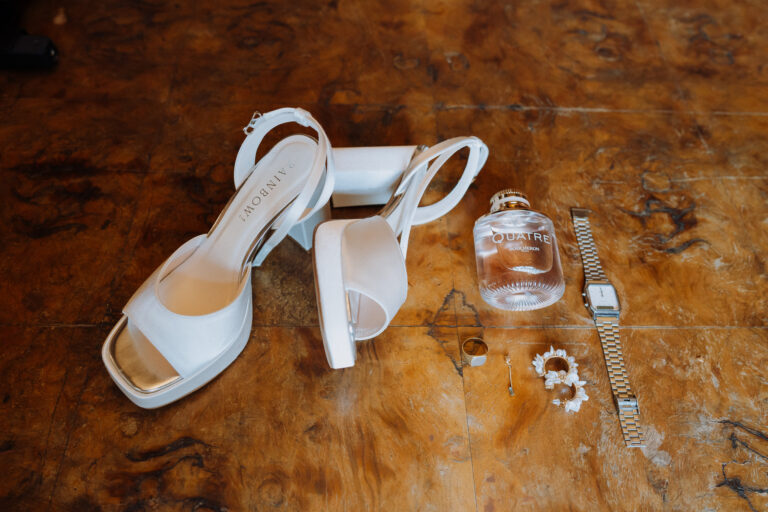 Wedding shoes and rings detail, Tuscany.