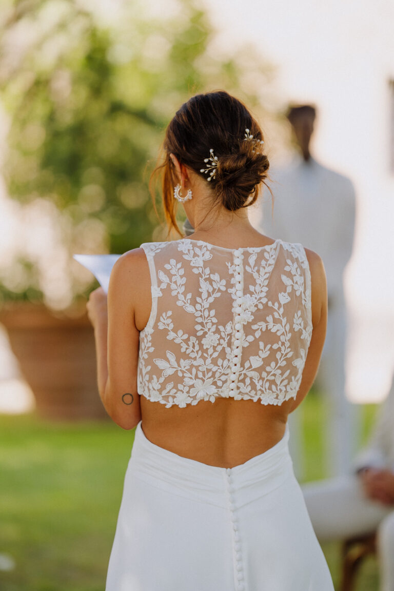 Bride from behind during the ceremony, Tuscany