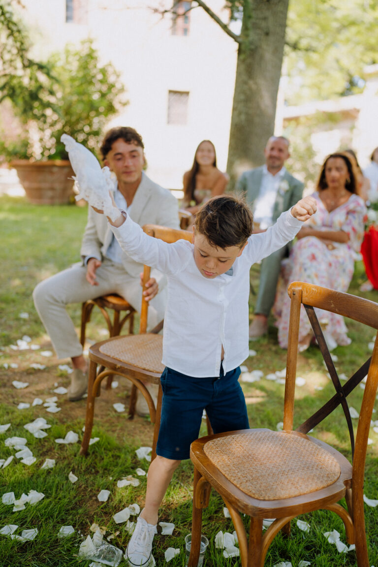 A ring bearer bringing the rings, villa cini