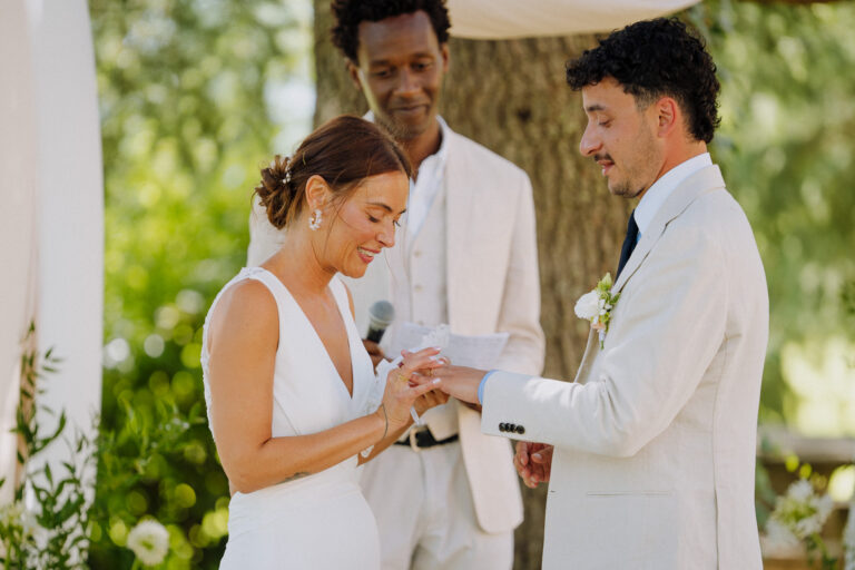 Ring exchange during ceremony, Villa Cini