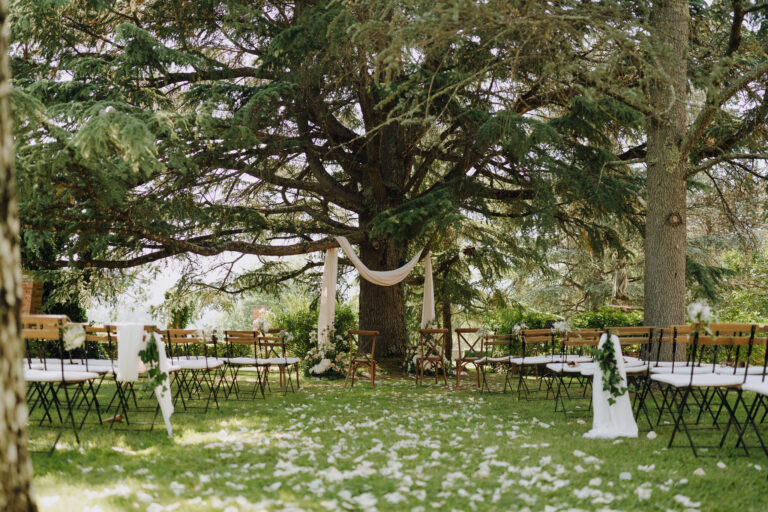 Wedding ceremony space under trees, Villa Cini