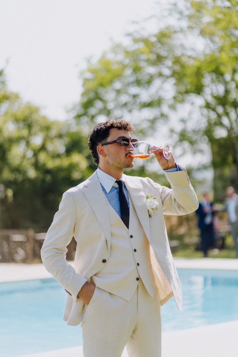 Groom during aperitivo, candid moment