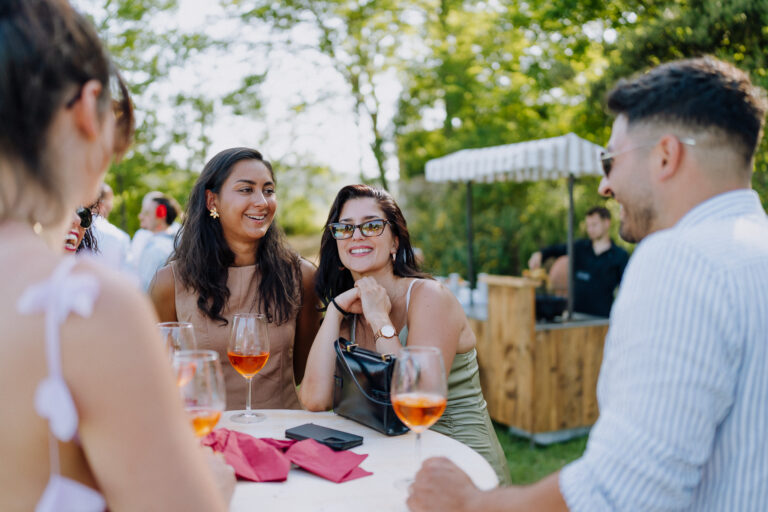 Guests talking during aperitivo at Villa Cini