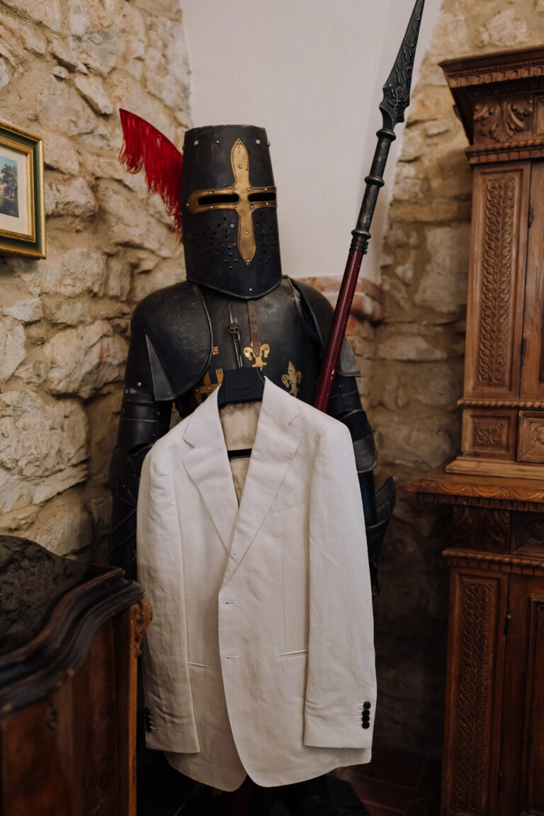 Groom suit detail hanging, Tuscany wedding.